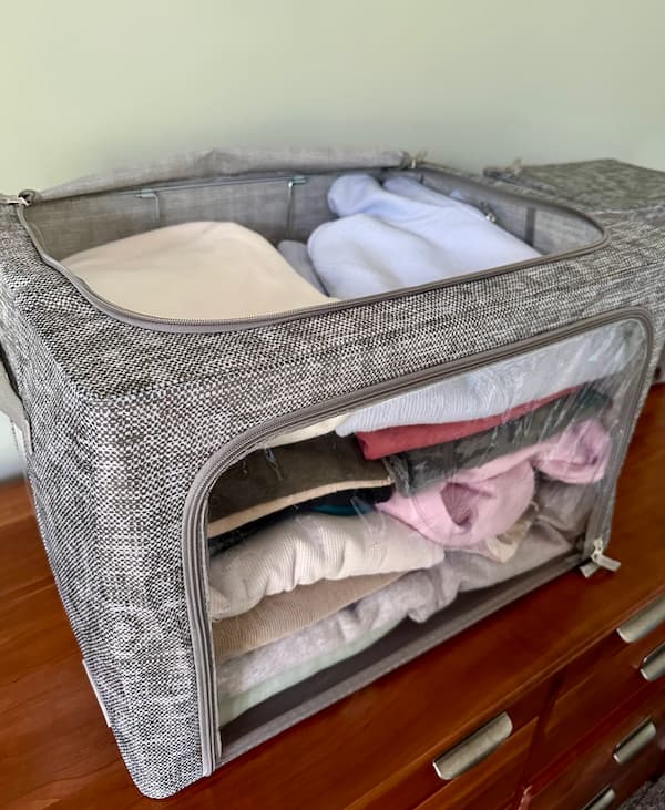 storage boxes filled with clothes